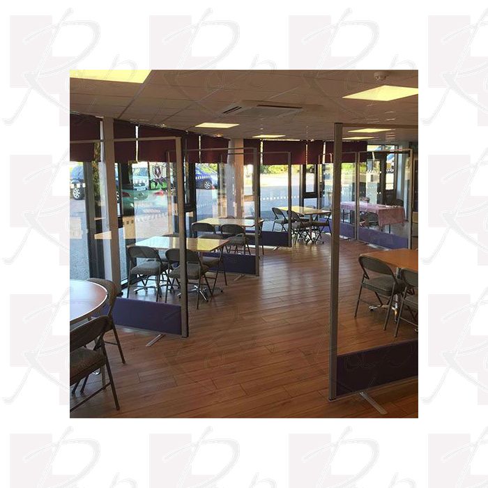 Full glazed free standing screens which include an acoustic base. 