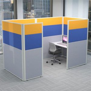 Concept acoustic office screens connected to create a single work pod, finish with yellow, blue and grey fabric. 