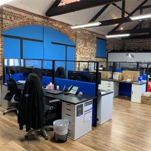 Morton Vision Top free standing screens with blue fabric, clear acrylic and black frame.